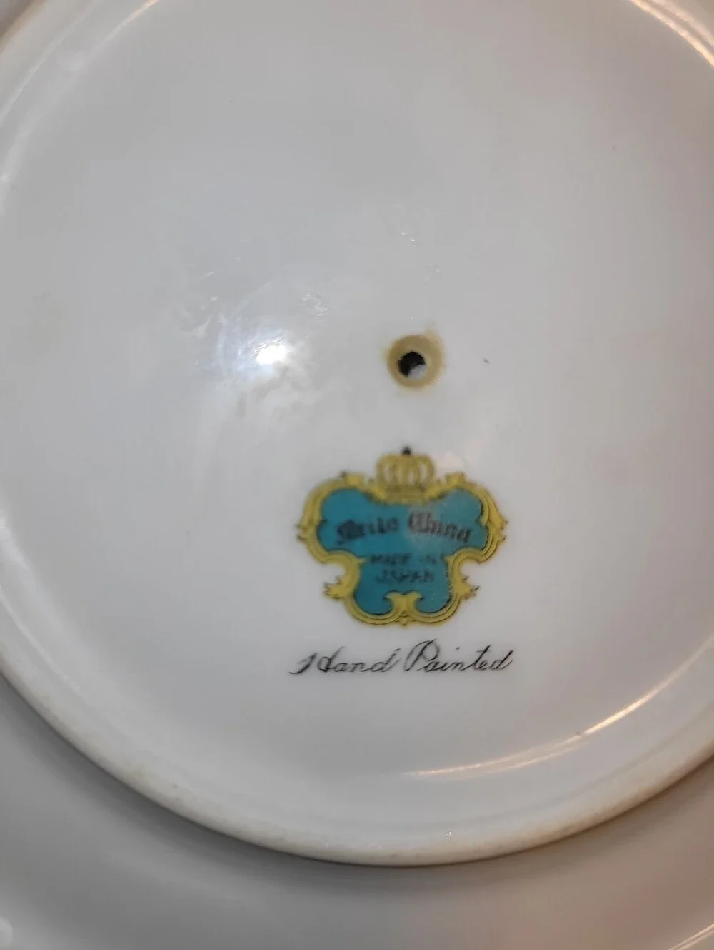 Mieto Porcelain Hand Painted Gravy Boat with Attached Saucer.
